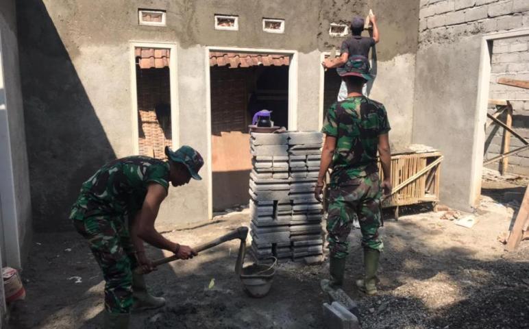 TUKANG BANGUNAN HANDAL DARI SATGAS TMMD 112