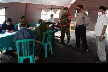 Satgas TMMD 112 Lakukan Pengamanan Vaksinasi 
